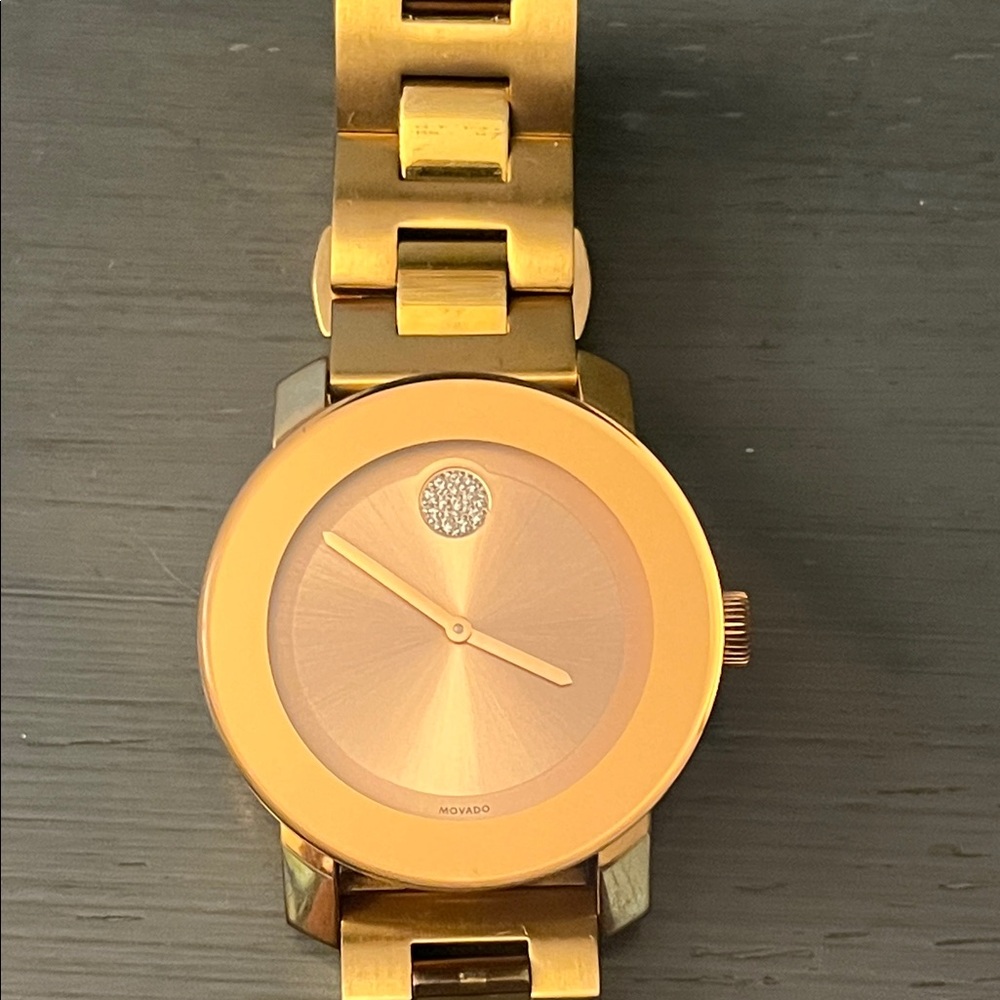 Pretty Movado Gold Women's Watch, great style, authentic, make an offer today!